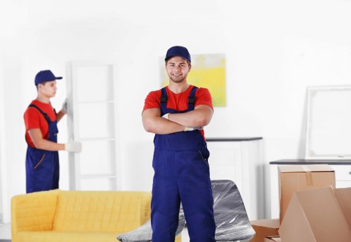 Professional office relocation services in Richmond with packed equipment and moving team