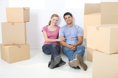 Boxes, furniture, and packing materials prepared for a Richmond house move