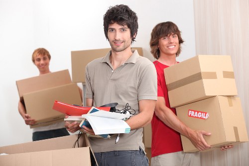 Man with a van loading furniture in Richmond for a transparent quoted move