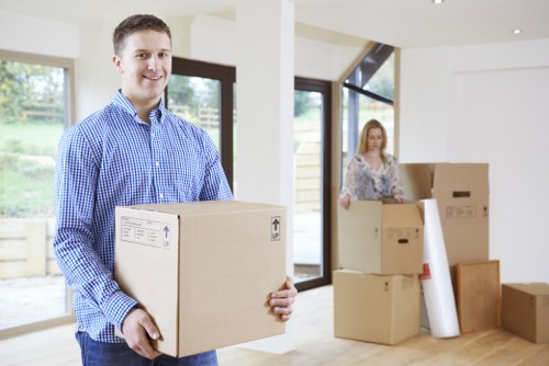 Professional movers carrying furniture during a Richmond relocation