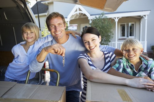 Professional movers handling furniture during a Richmond flat removal
