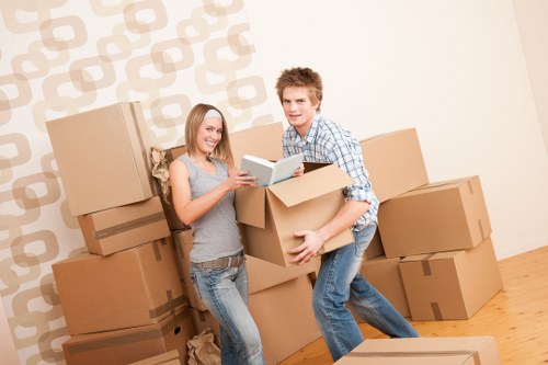 Specialist movers loading a piano securely for transport in Richmond