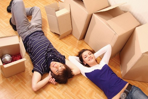 Professional man with a van team loading furniture in Richmond